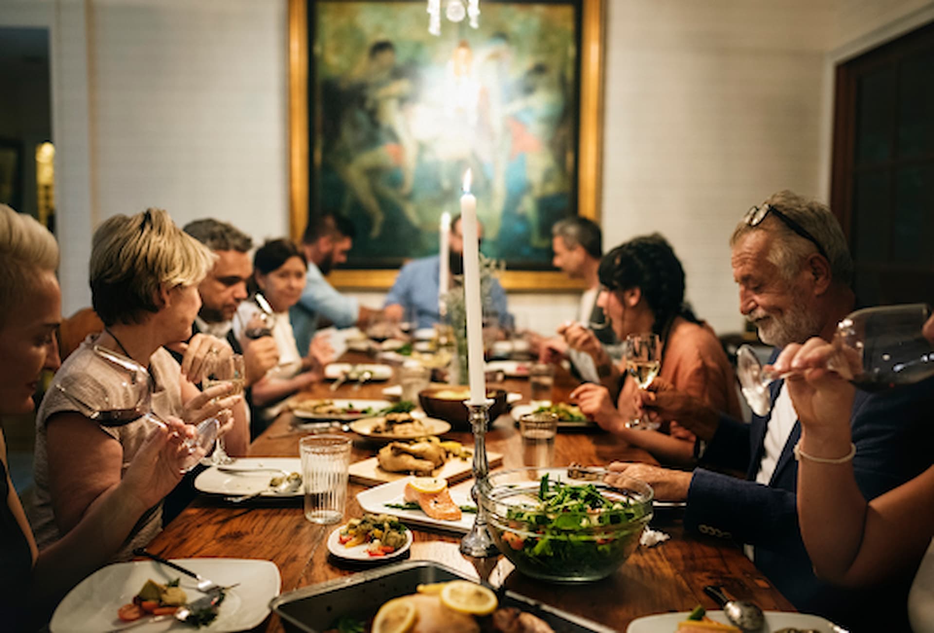 group diverse friends are having dinner together