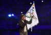 The Golden Handover: Tom Cruise Makes History at the Olympics Closing Ceremony Tom Cruise hands Olympic flag to Los Angeles ...